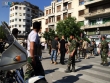 عناصر لواء أبو الفضل العباس بالقرب من قيادة الشرطة في العاصمة